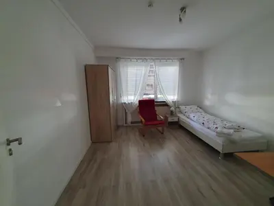 Ein Bett oder Betten in einem Zimmer der Unterkunft Privatzimmer an der Universitätsklinik Mainz. Sehr zentral