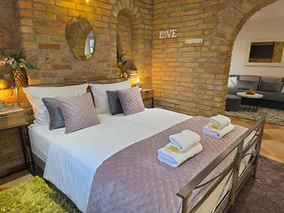 Ein Bett oder Betten in einem Zimmer der Unterkunft Altstadt Speyer