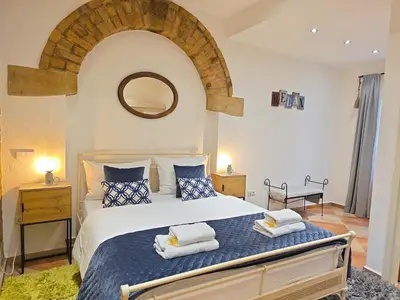 Ein Bett oder Betten in einem Zimmer der Unterkunft Altstadt Speyer