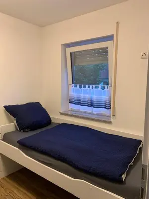 Ein Bett oder Betten in einem Zimmer der Unterkunft Ferienwohnung Gergert Nr6