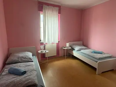Ein Bett oder Betten in einem Zimmer der Unterkunft Monteurwohnung Niefern