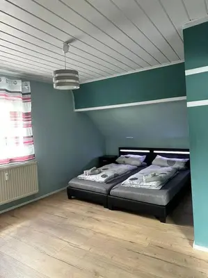 Ein Bett oder Betten in einem Zimmer der Unterkunft Gemütliche Wohnung in Pforzheim