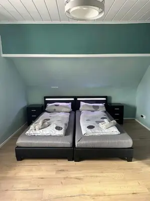 Ein Bett oder Betten in einem Zimmer der Unterkunft Gemütliche Wohnung in Pforzheim