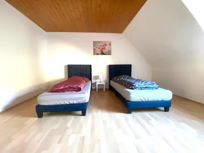 Ein Bett oder Betten in einem Zimmer der Unterkunft Komfortables Apartment
