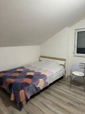 Ein Bett oder Betten in einem Zimmer der Unterkunft Kuscheliges Einfamilienhaus