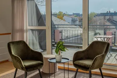 Ein Balkon oder eine Terrasse in der Unterkunft Penthouse-Maisonette - City Center, Highspeed Internet, Garage
