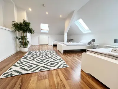 Ein Bett oder Betten in einem Zimmer der Unterkunft Modern Ruhig 6 Gäste 110m2 Wlan