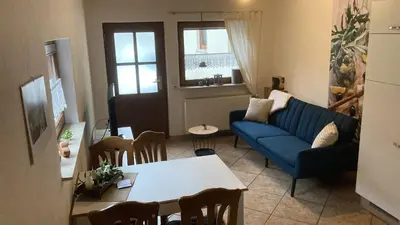 Ein Sitzbereich in der Unterkunft Ferienwohnung am Schloss
