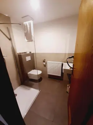 Ein Badezimmer in der Unterkunft Pension Dorfengel