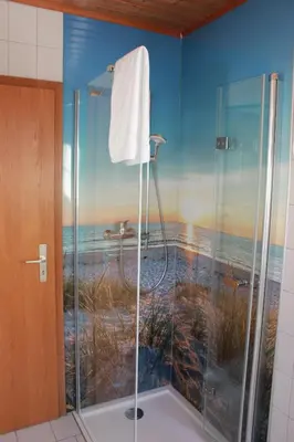 Ein Badezimmer in der Unterkunft Pension Dorfengel