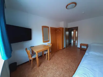Ein Bett oder Betten in einem Zimmer der Unterkunft Pension Dorfengel