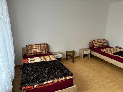 Ein Bett oder Betten in einem Zimmer der Unterkunft Ferienwohnung Grimm