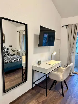 Ein Bett oder Betten in einem Zimmer der Unterkunft Waldstadt Urban nähe KIT