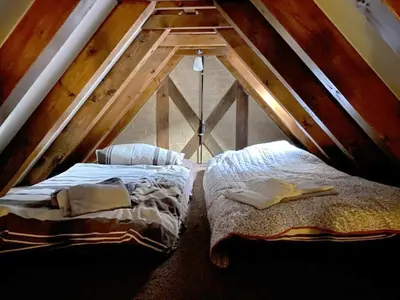 Ein Bett oder Betten in einem Zimmer der Unterkunft Großes Ferienhaus mit Sauna & Garten in St Martin