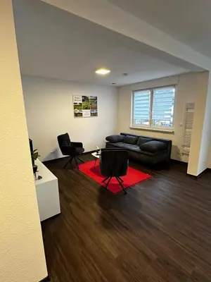 Ein Sitzbereich in der Unterkunft Barrierefreie Ferienwohnungen in der Nähe der Golf- und Freizeitanlage