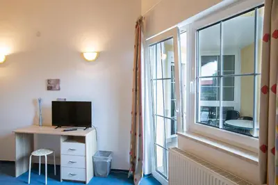 TV/Unterhaltungsangebot in der Unterkunft Hotel Schlosshof Dolgesheim