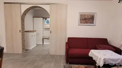 Ein Sitzbereich in der Unterkunft Zum Pfalzwanderer