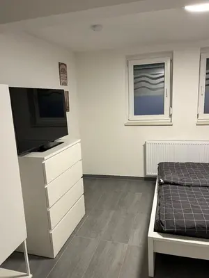 Ein Bett oder Betten in einem Zimmer der Unterkunft Home for You- Monteurwohnung Ferienwohnung 2