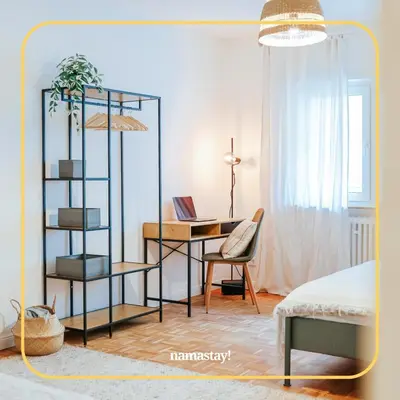 Ein Bett oder Betten in einem Zimmer der Unterkunft namastay! Stilvoll Wohnen im Herzen von Mannheim