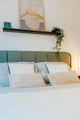 Ein Bett oder Betten in einem Zimmer der Unterkunft namastay! Stilvoll Wohnen im Herzen von Mannheim