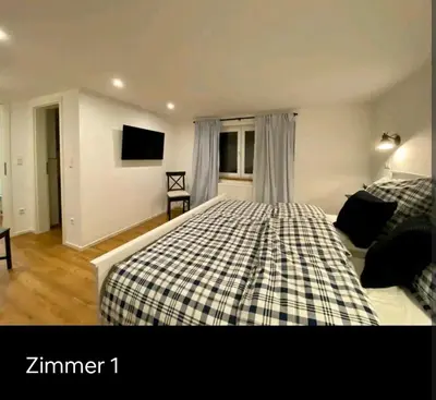 Ein Bett oder Betten in einem Zimmer der Unterkunft Reiter's Apartments am Eichelberg