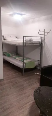 Ein Bett oder Betten in einem Zimmer der Unterkunft Komfortable Wohnung in Happenbach
