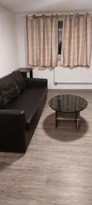 Ein Sitzbereich in der Unterkunft Komfortable Wohnung in Happenbach