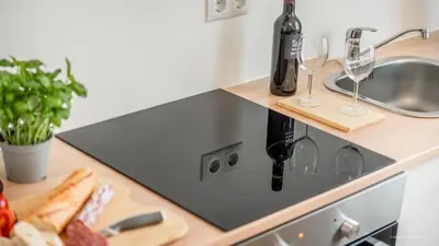 Küche/Küchenzeile in der Unterkunft WineDesign Boxspring 8 Pers BASF Nähe Ludwigshafen und Mannheim
