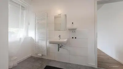 Ein Badezimmer in der Unterkunft WineDesign Boxspring 8 Pers BASF Nähe Ludwigshafen und Mannheim