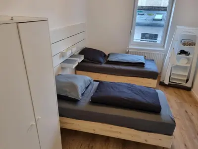 Ein Bett oder Betten in einem Zimmer der Unterkunft City Central Apartment House