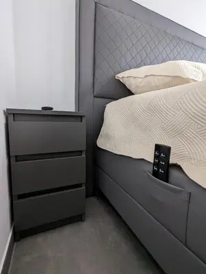 Ein Bett oder Betten in einem Zimmer der Unterkunft View