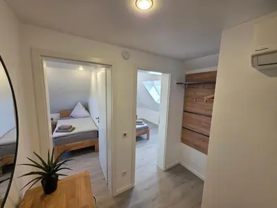 Ein Bett oder Betten in einem Zimmer der Unterkunft Handwerkerwohnung, Monteurunterkunft-Rodgau