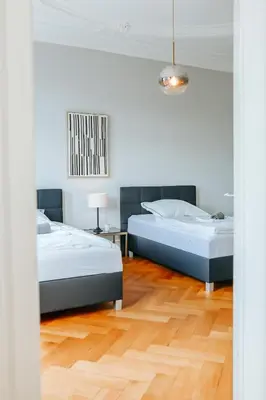 Ein Bett oder Betten in einem Zimmer der Unterkunft namastay! Stilvoll Wohnen in Bestlage Mannheims - 3BR