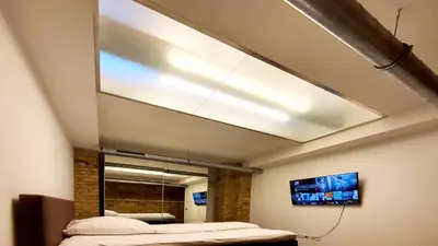 TV/Unterhaltungsangebot in der Unterkunft 1-Zimmer-Wohnung im Loft