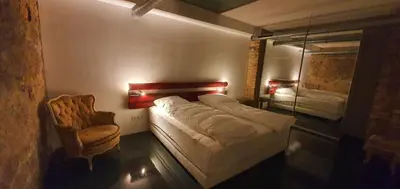 Ein Bett oder Betten in einem Zimmer der Unterkunft 1-Zimmer-Wohnung im Loft