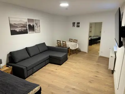 Ein Sitzbereich in der Unterkunft 5-room apartment (120 sqm) with 2 bathrooms, 2 kitchens, bar area & balcony directly in the city centre