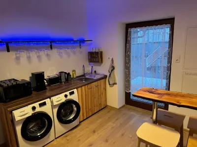 Küche/Küchenzeile in der Unterkunft 5-room apartment (120 sqm) with 2 bathrooms, 2 kitchens, bar area & balcony directly in the city centre