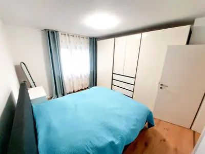 Ein Bett oder Betten in einem Zimmer der Unterkunft Haus am See