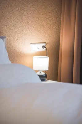 Ein Bett oder Betten in einem Zimmer der Unterkunft TOP Apartments - Moderne Altbauwohnung im Zentrum Ludwigsburg - Kingsize Bett - Netflix - 80qm - 24h Check-In