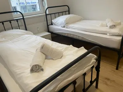 Ein Bett oder Betten in einem Zimmer der Unterkunft Timeless: 4 Zimmer Apartment Ludwigsburg