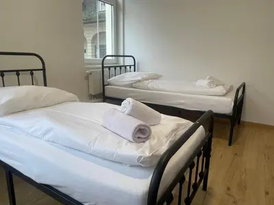 Ein Bett oder Betten in einem Zimmer der Unterkunft Timeless: 4 Zimmer Apartment Ludwigsburg