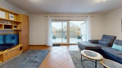 Ein Sitzbereich in der Unterkunft Ferienhaus Hoffmann am Rheinbogen