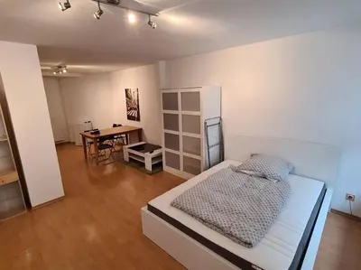 Ein Bett oder Betten in einem Zimmer der Unterkunft City Central Apartment