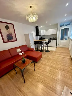 Ein Sitzbereich in der Unterkunft Exklusives Haus, ruhig gelegen im Innenhof, zentral, lichtdurchflutet Zustellbett,Babybett bei Bedarf