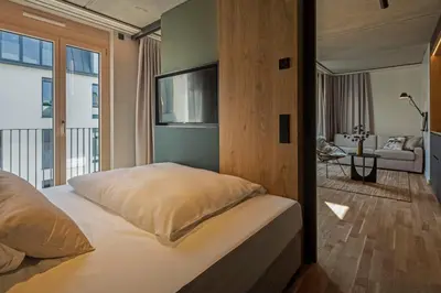 Ein Bett oder Betten in einem Zimmer der Unterkunft B5 Apartments