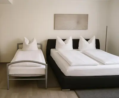 Ein Bett oder Betten in einem Zimmer der Unterkunft Ferienwohnung Panoramablick