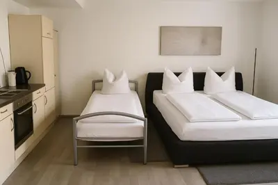 Ein Bett oder Betten in einem Zimmer der Unterkunft Ferienwohnung Panoramablick