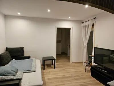 Ein Sitzbereich in der Unterkunft T&G WirthHaus