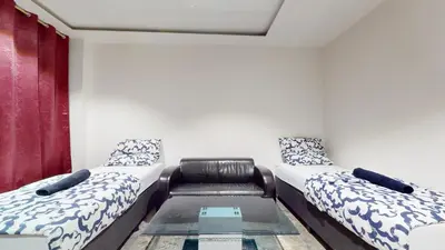 Ein Bett oder Betten in einem Zimmer der Unterkunft Garten Gästehaus