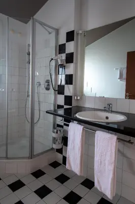 Ein Badezimmer in der Unterkunft Hotel & Restaurant Bestenheider Stuben